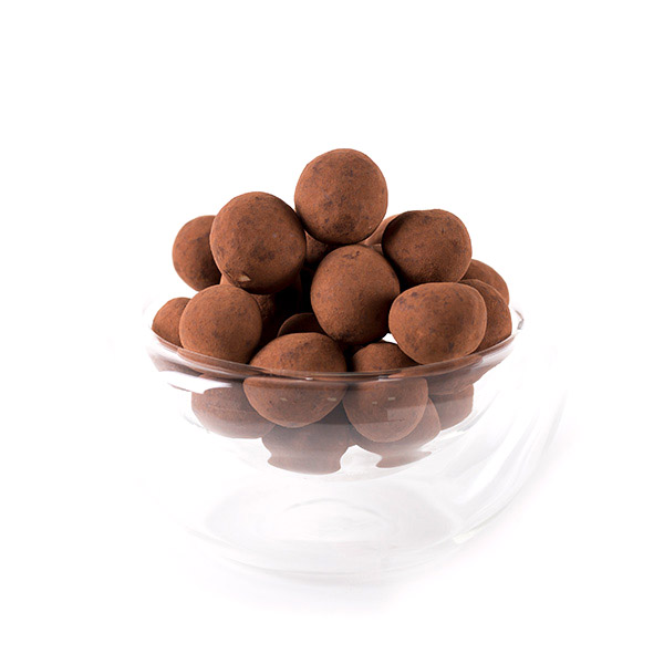 Akitanias o Nueces de Macadamia de Marca Palmira Expuestas en un Cuenco